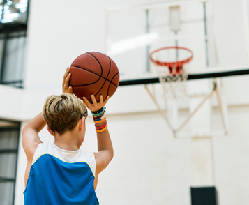 Child playing basketball