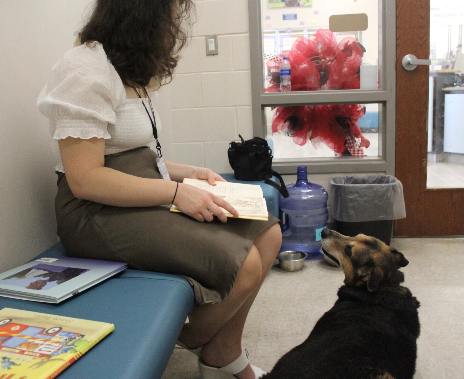 Person reading to a dog