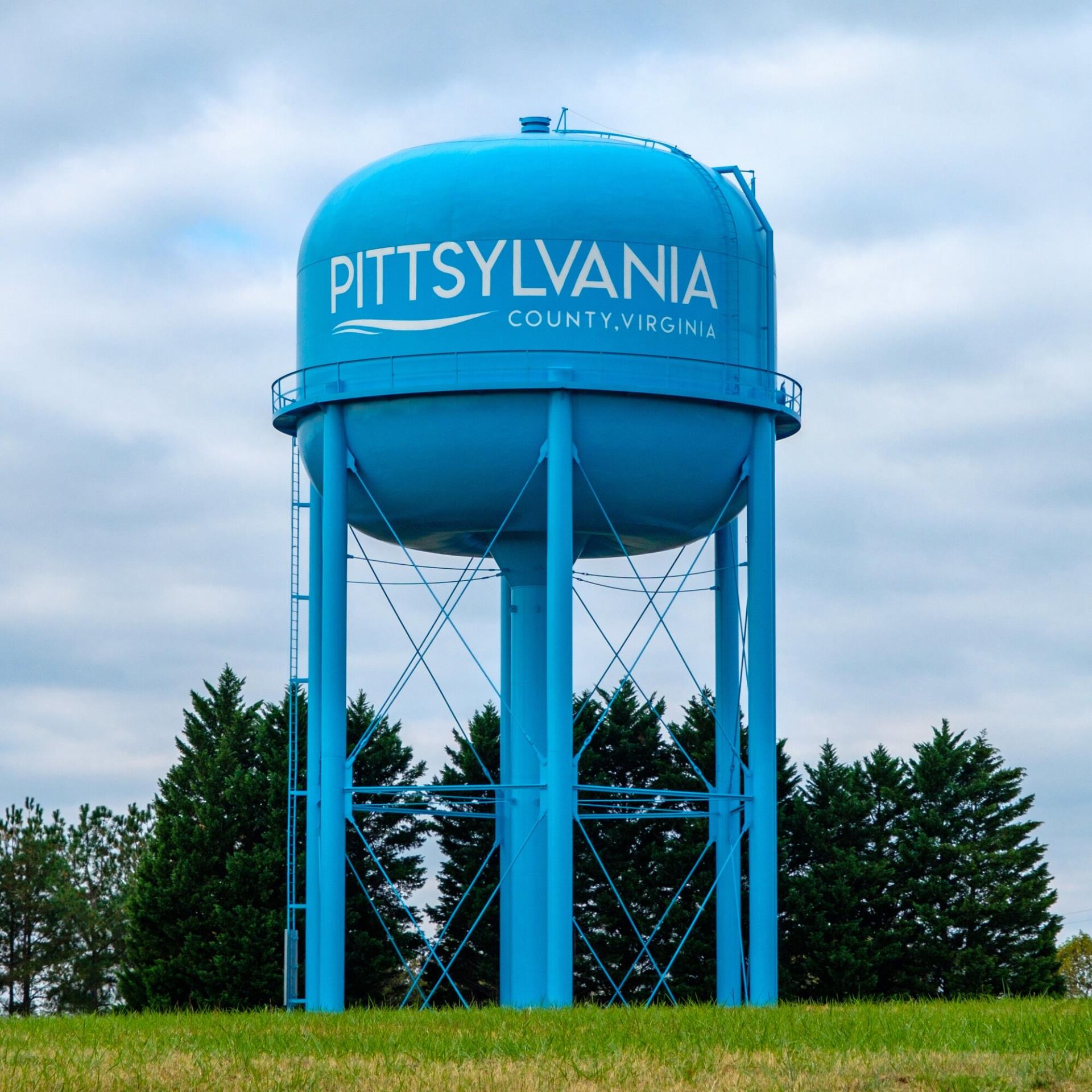 Photo of Blue Water Tower that Says "Pittsylvania" with Cloudy background