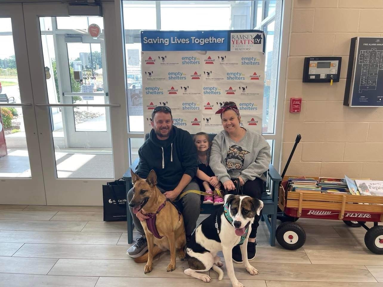 Family with two dogs